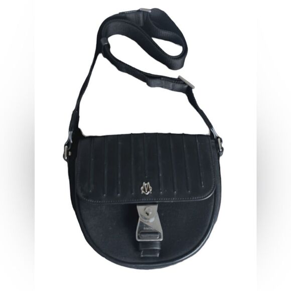 Luxurious “Never Still” Crossbody Saddlebag by Rimowa Exclusive - Picture 3 of 10